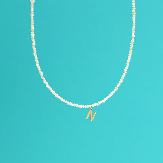 Pearl necklace initial